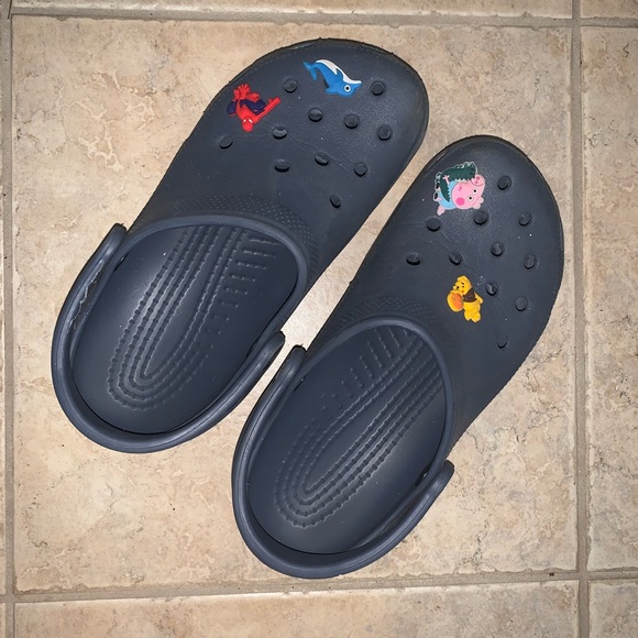 blue crocs with charms